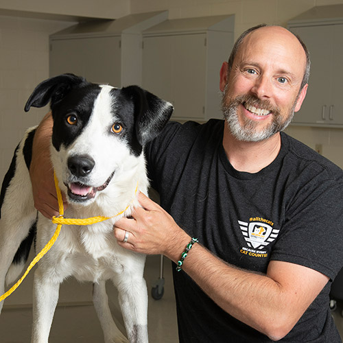 Andy with shelter dog