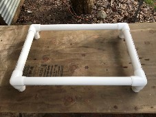 photo of assembled bed frame on table