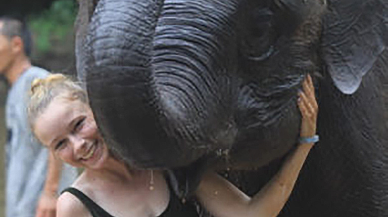 Emma Hewitt, RVT, with elephant