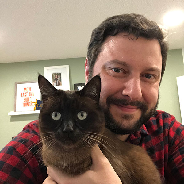 Photo of Henri Teixeira with his cat